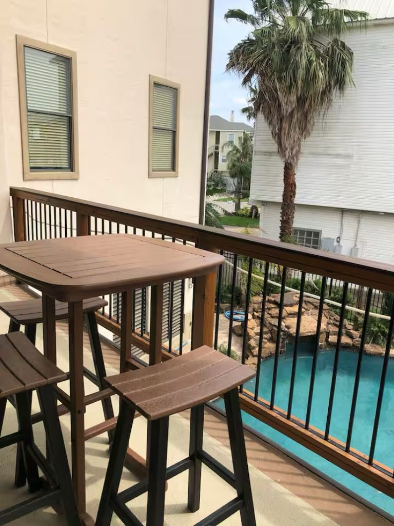 Balcony seating above the pool in Galveston