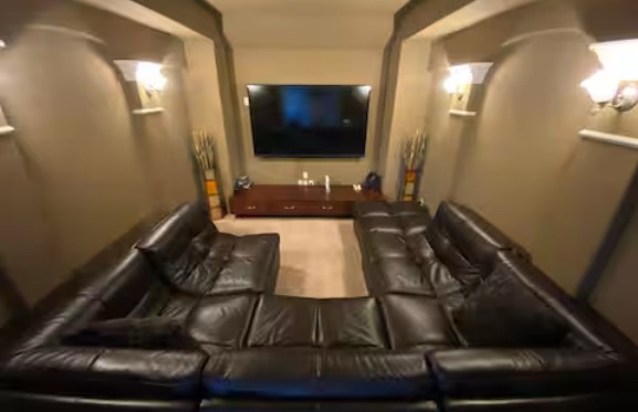 Media room with theater seating in Pearland